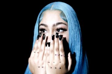 North West ja lävistykset kädessä